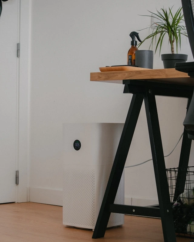 white air-purifier placed in a home